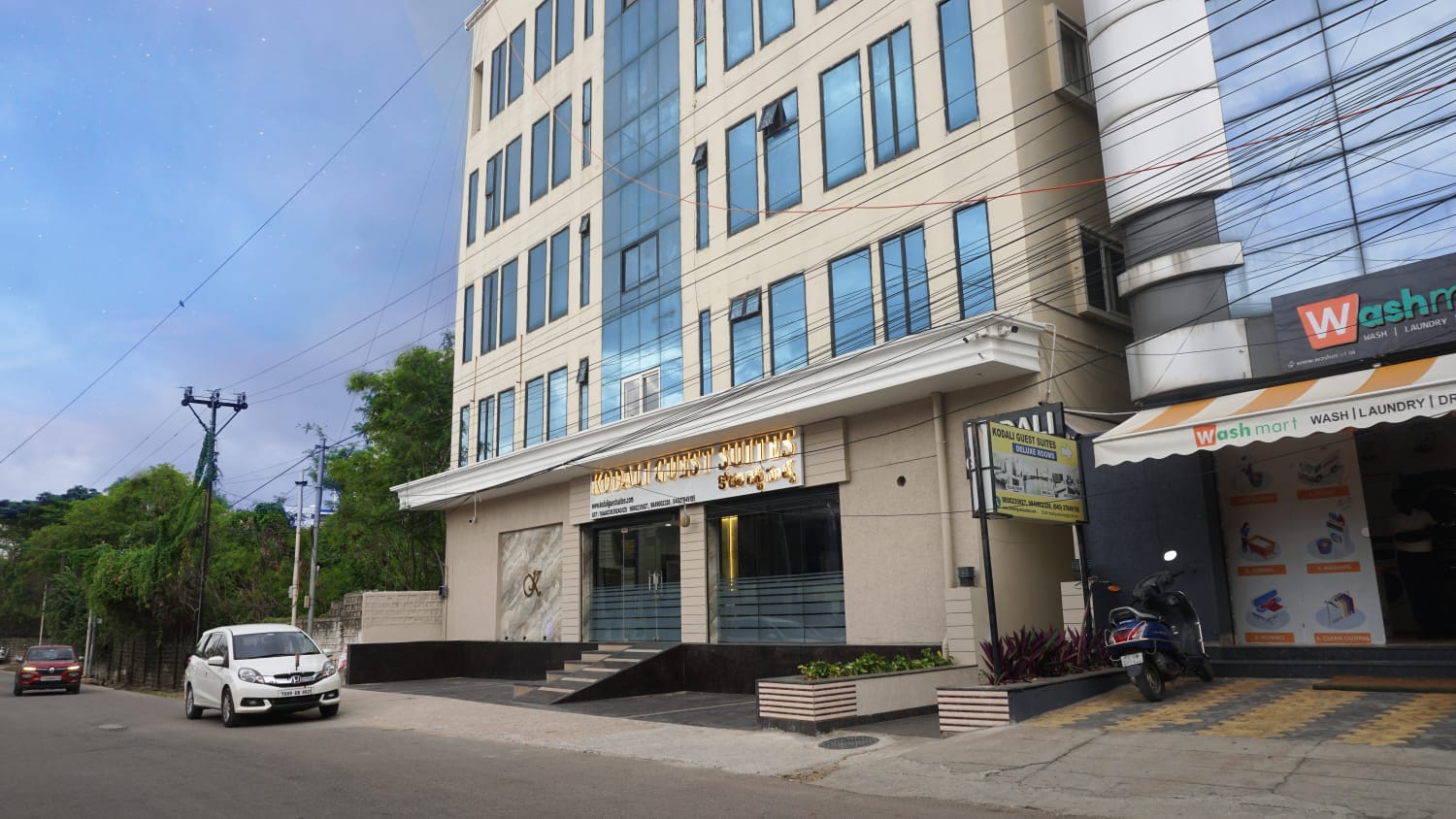 Happy guest at Kodali Room Suites